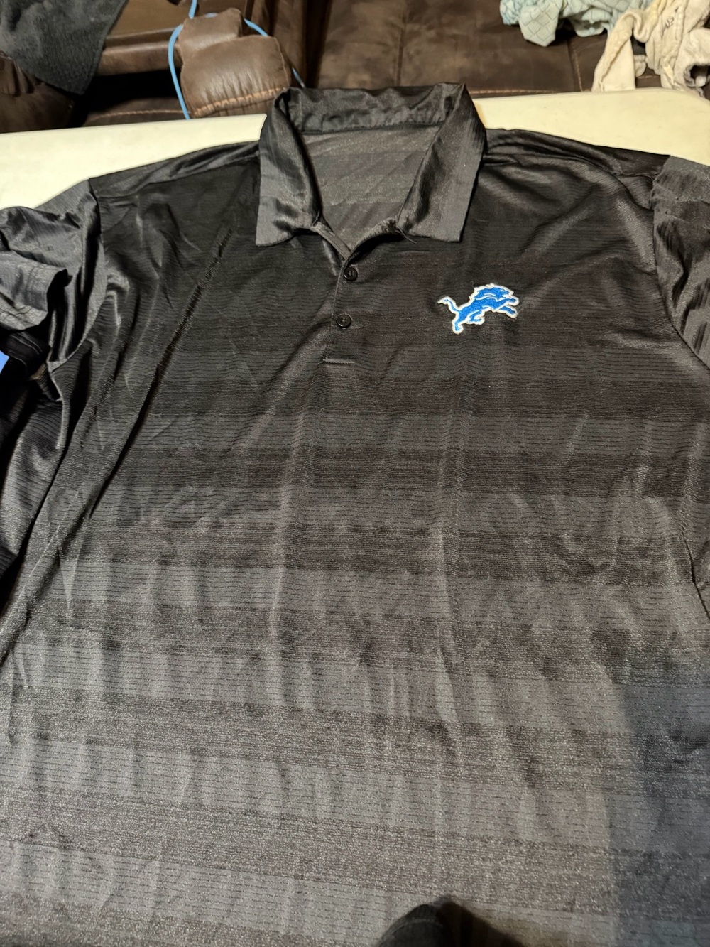 Men's Black Polo Shirt with Blue Lion Logo